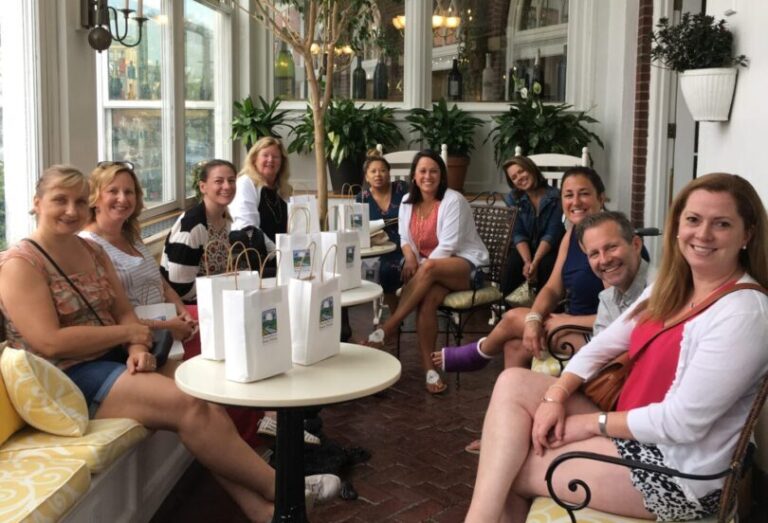A group of travelers with their gift bags meeting for a food tour