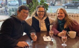 local food tour guests with dessert chocolate mousse