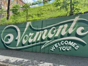 Vermont Welcome mural in forest green